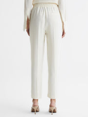 Reiss Trousers | Hailey Pull-On Tapered Trousers Cream - Women