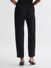 Reiss Trousers | Theo Taper Tapered Fit Side Stripe Trousers Black - Women