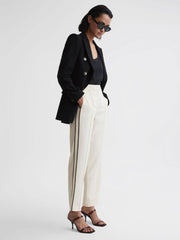 Reiss Trousers | Theo Taper Tapered Fit Side Stripe Trousers Cream - Women