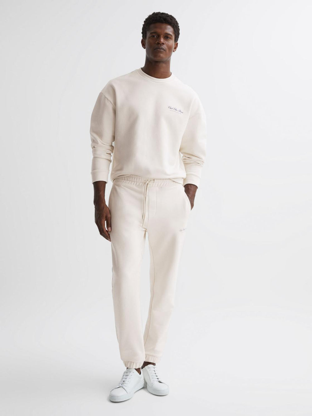 Reiss Trousers | Dawson Reiss | Ché Motif Cotton Drawstring Joggers Off White - Men