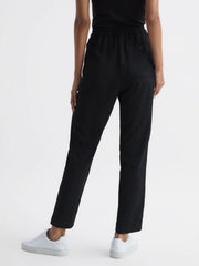 Reiss Trousers | Odell Taper Tapered Leg Pull-on Trousers Black - Women