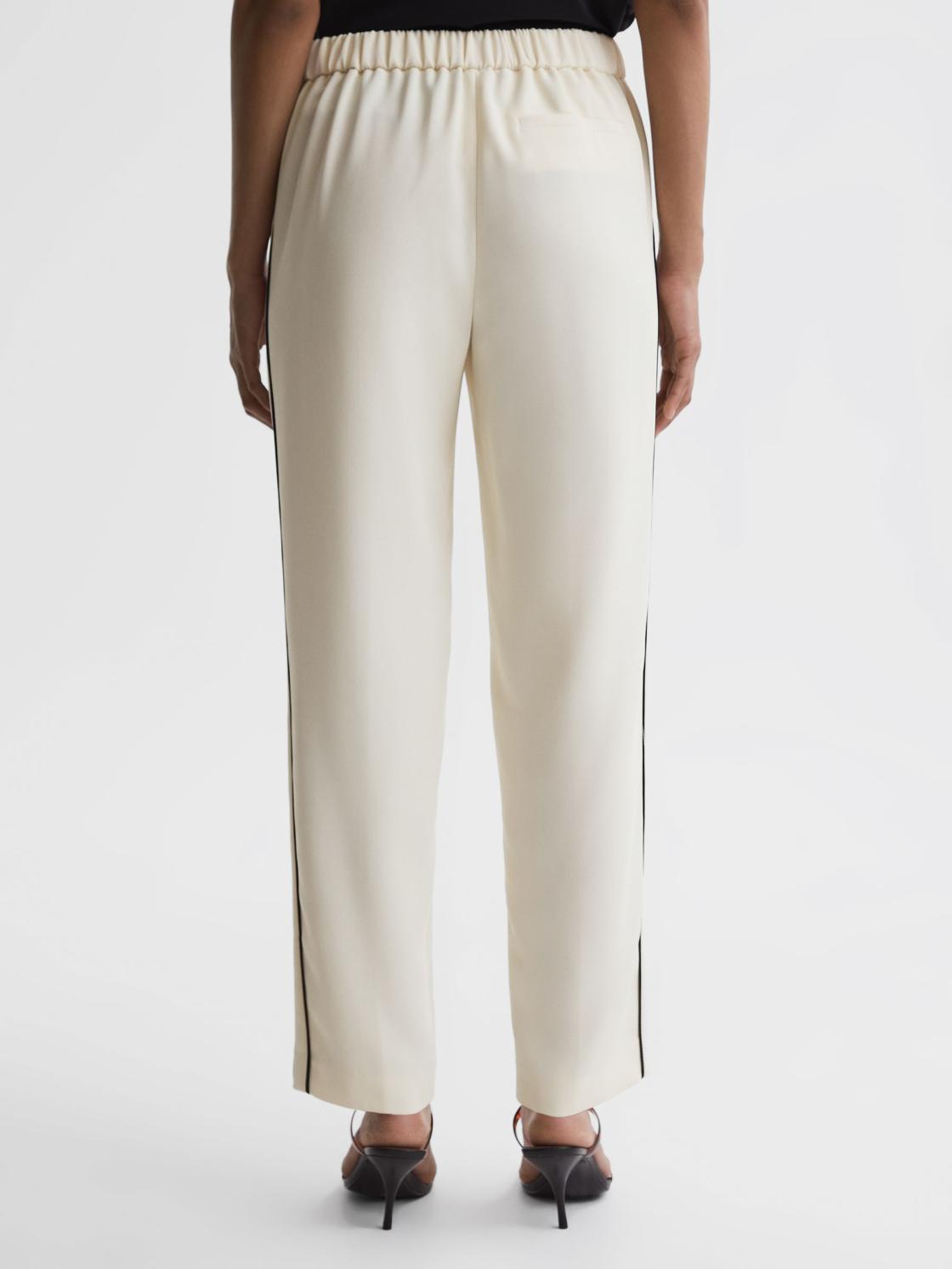 Reiss Trousers | Theo Taper Tapered Fit Side Stripe Trousers Cream - Women